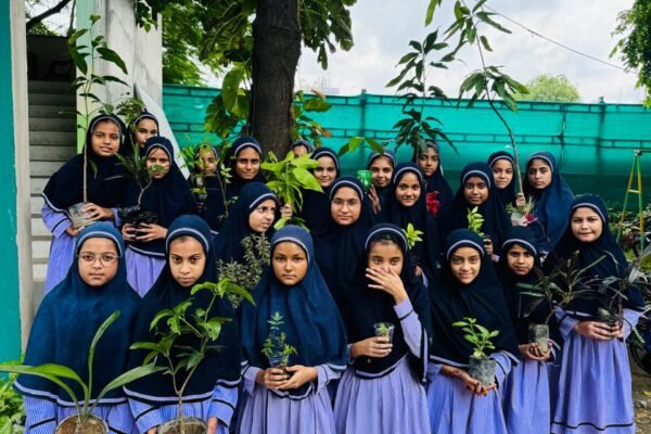 Students of DAPS Raebareli holding saplings for the tree plantation drive