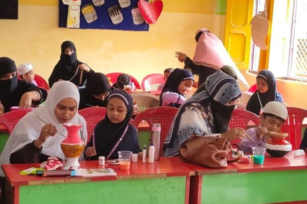 Early-years children at an activity table in a DAPS Raebareli classroom