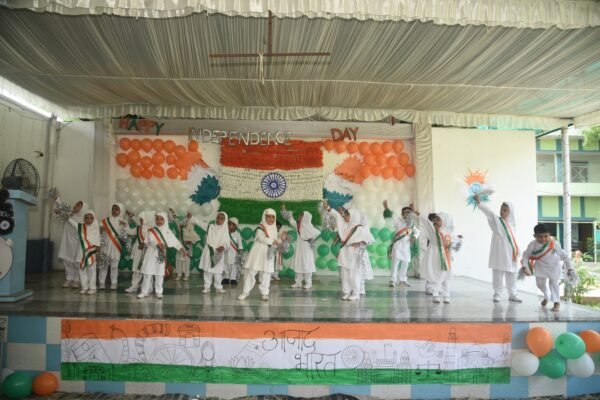 Junior students performing on stage at the DAPS Raebareli Independence Day celebration