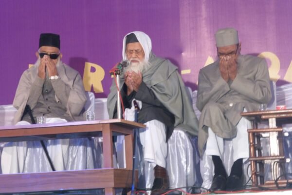 Guests seated on stage at a DAPS Raebareli function
